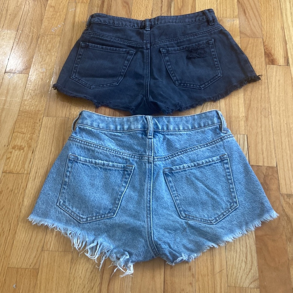 Women’s Pacsun Jean shorts. Blue and black. Size 24
