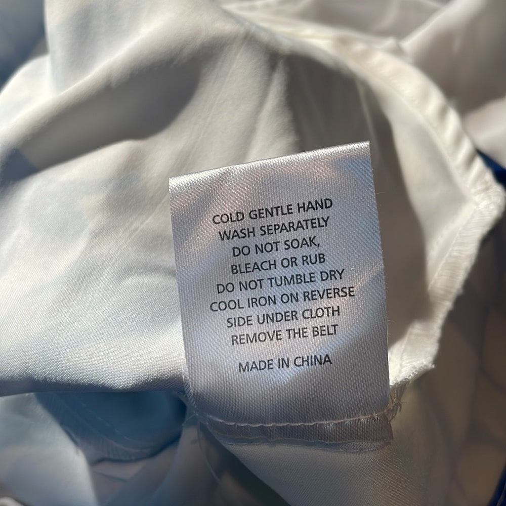 Style Stalker Women’s white and blue long sleeved romper Size XS