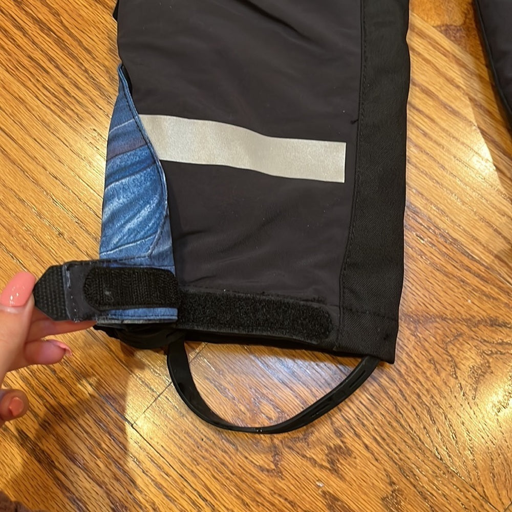 Molo Boy’s Blue and Black Ski Pants With Wing Design Size 4 104cm