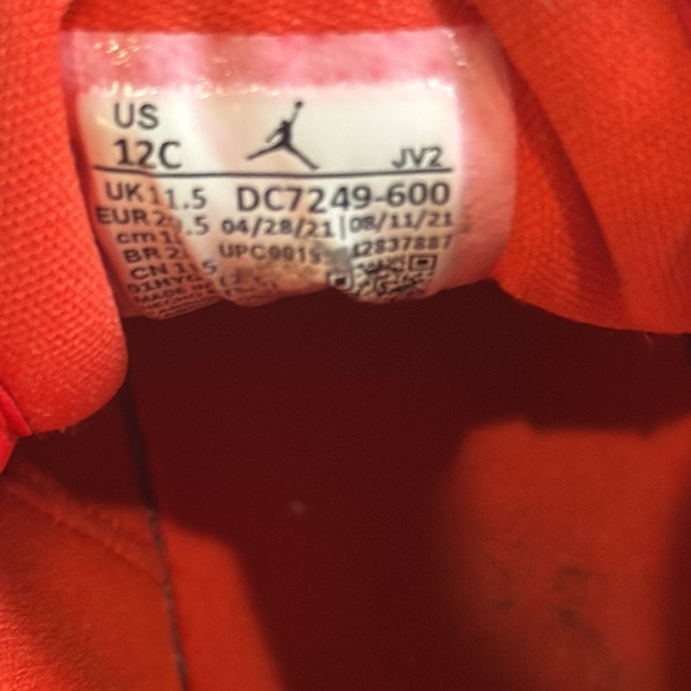 Jordan Air Jordan’s Kids Red And White Mid Tops Size 12