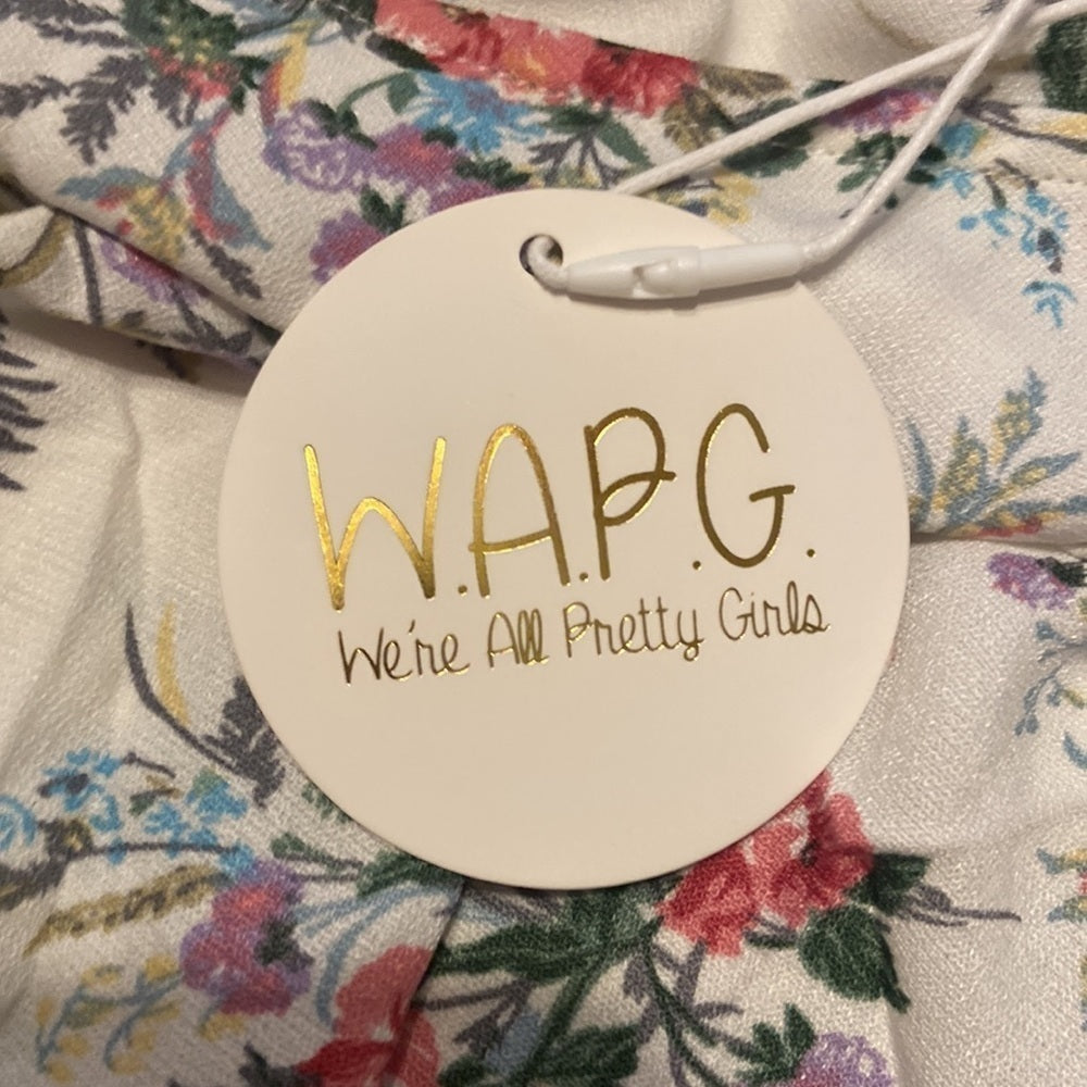 WOMEN’S We’re All Pretty Girls top. White with floral. Size M