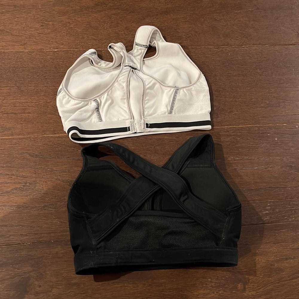Two Under Armour Sports Bras Black and White Size M
