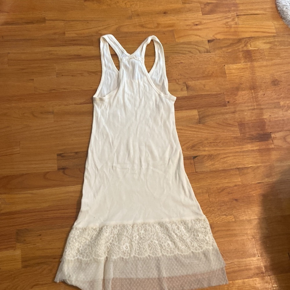 Women’s keepsake cream top. Size L