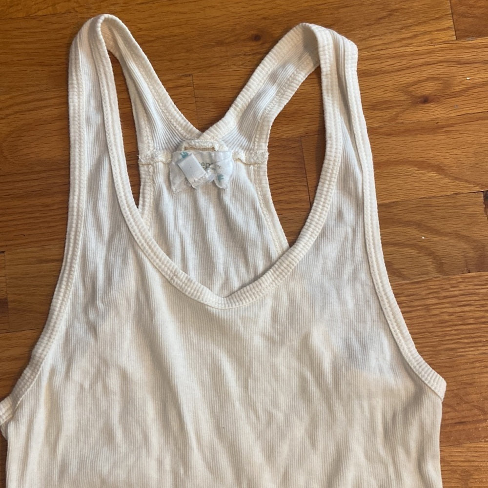 Women’s keepsake cream top. Size L