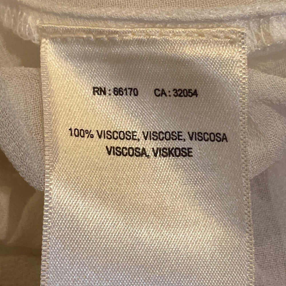 Anthropologie women’s white flowy top with floral details size medium