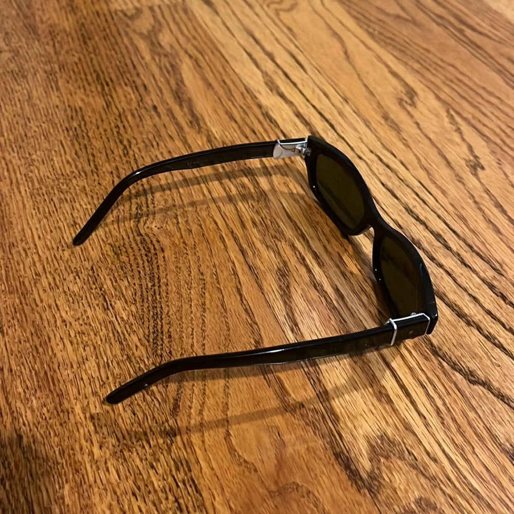 Woman’s Black Sunglasses