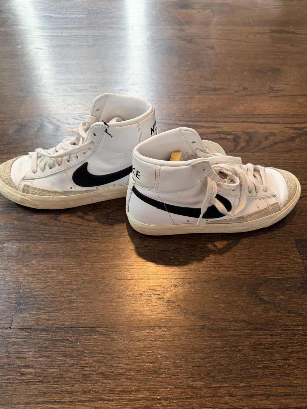 Nike Women’s White High-Top Sneakers with Black Swoosh Size 7