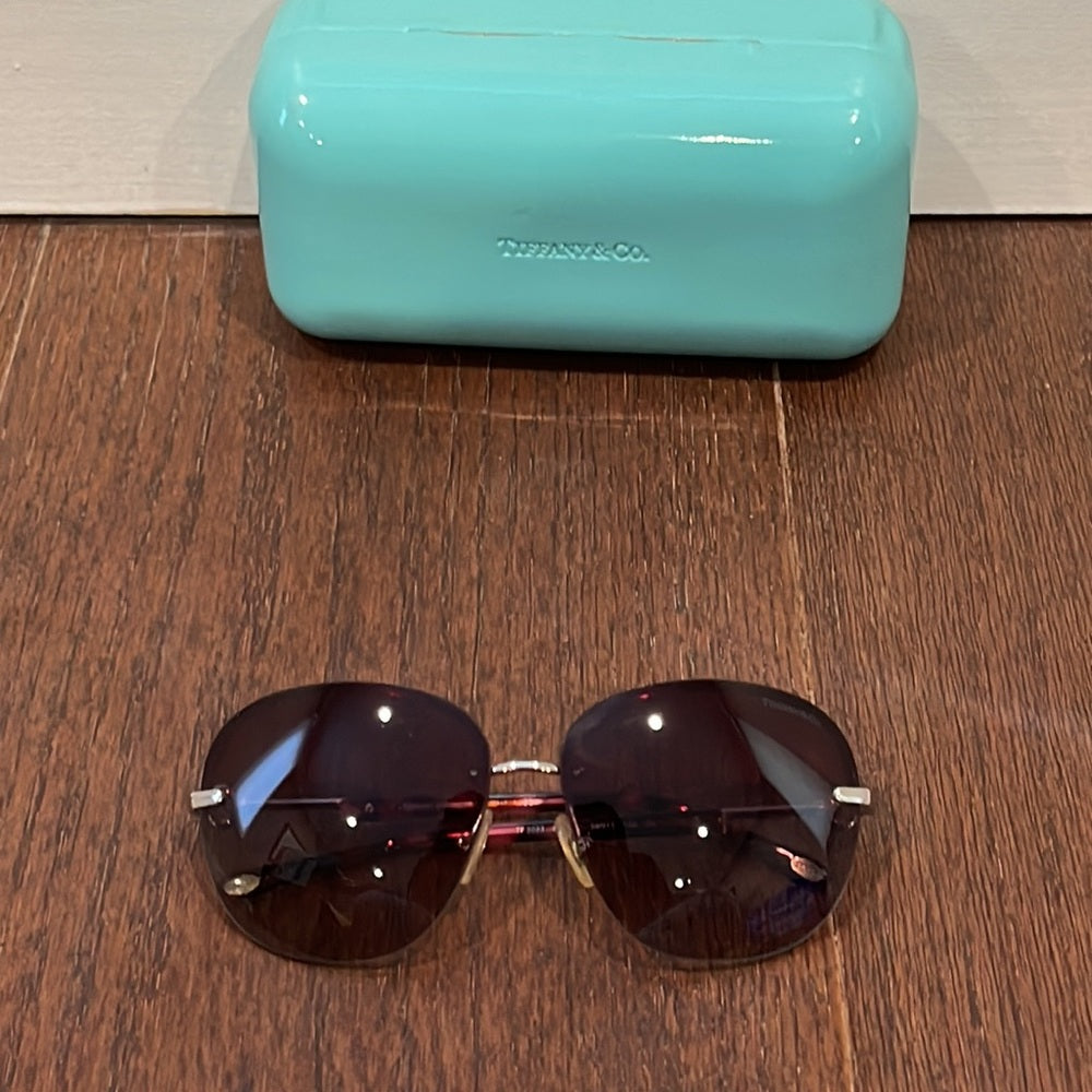 Tiffany & Co Women’s Sunglasses With a Red/Pink to Lenses