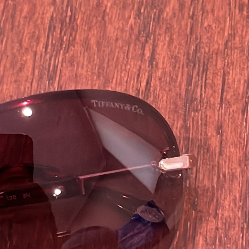 Tiffany & Co Women’s Sunglasses With a Red/Pink to Lenses