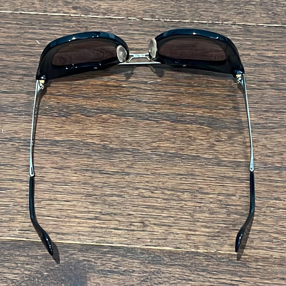 Prada Women’s Black and Gold Sunglasses