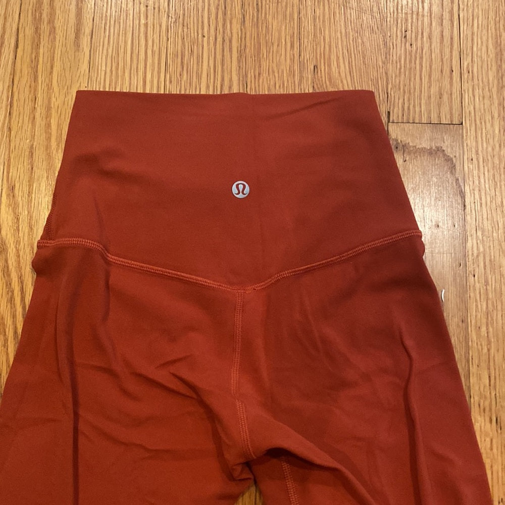 Lululemon brick Red/Brown colored leggings size 2