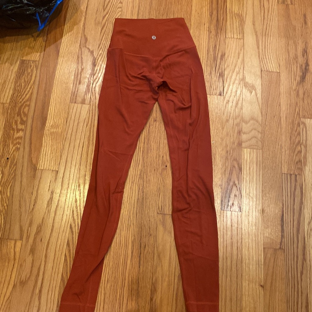 Lululemon brick Red/Brown colored leggings size 2