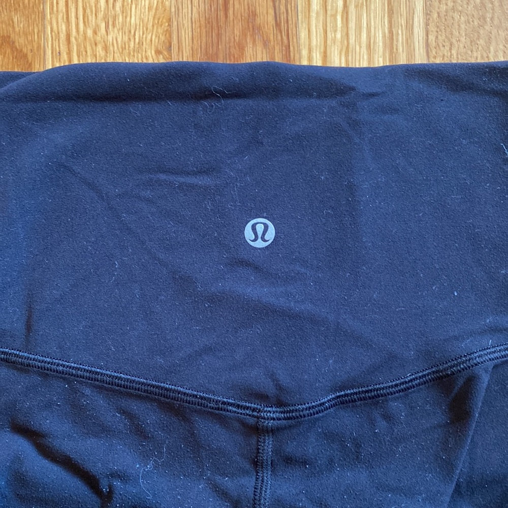 Lululemon black leggings size 4