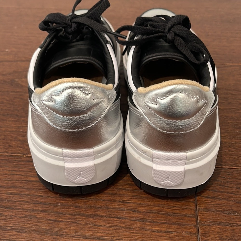 Nike Air Women’s Black, White and Silver Low Top Sneakers Size 10