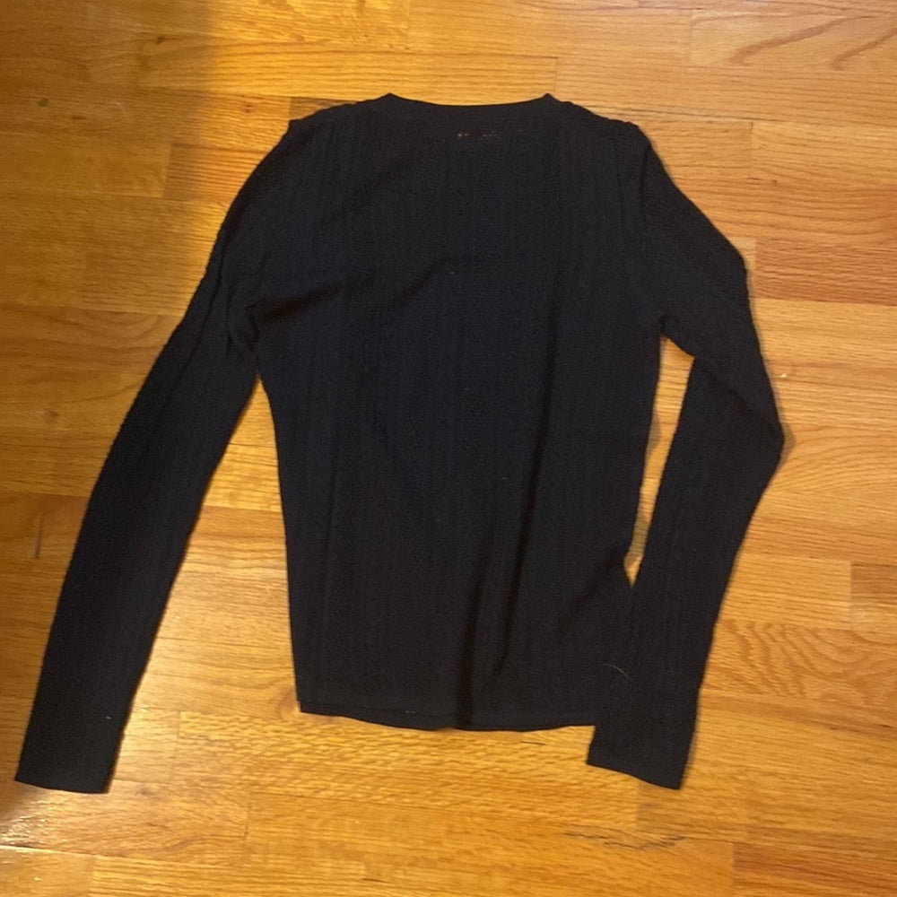 Women’s black long sleeved top