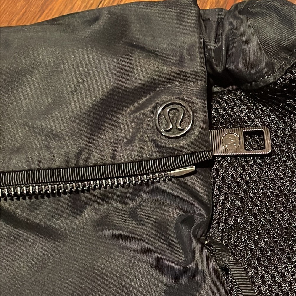 Lululemon Black drawstring fold up bag with inner pocket