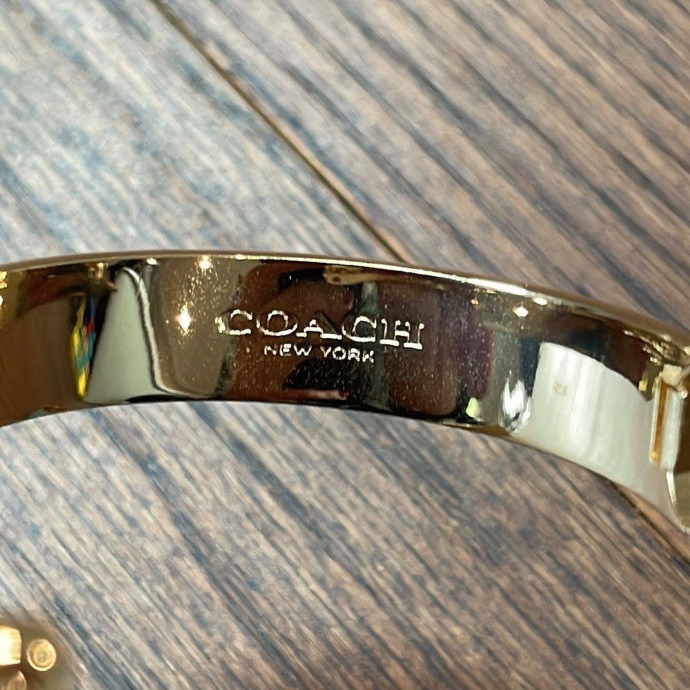 COACH Women’s Pink and Gold Bengal Bracelet