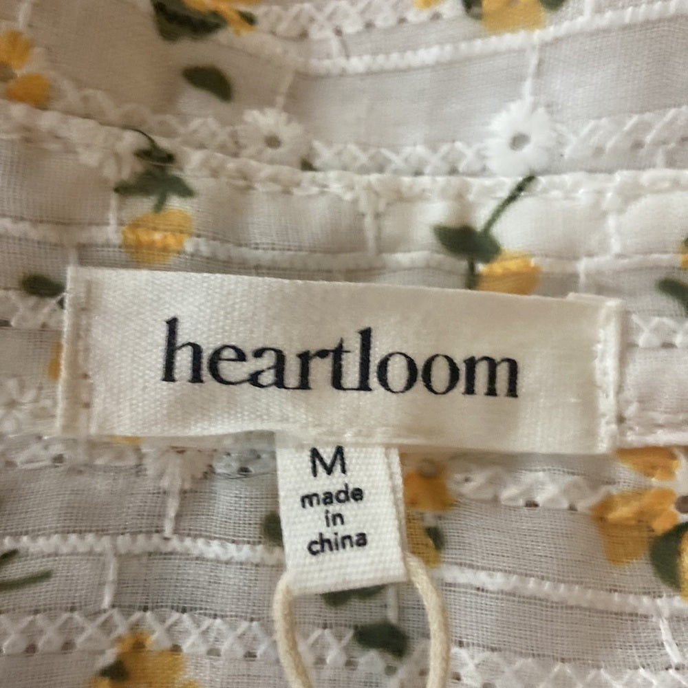 Women’s heartloom top. White with yellow and green flowers. Size M