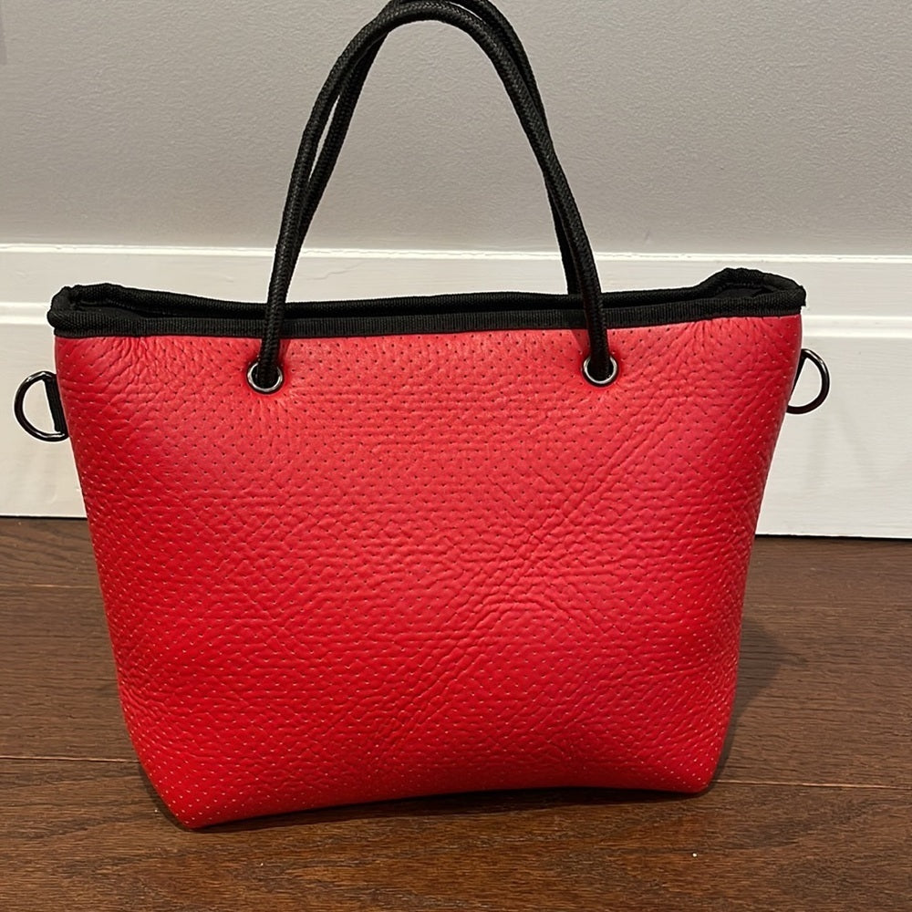 Haute Shore Red Perforated Shoulder Bag