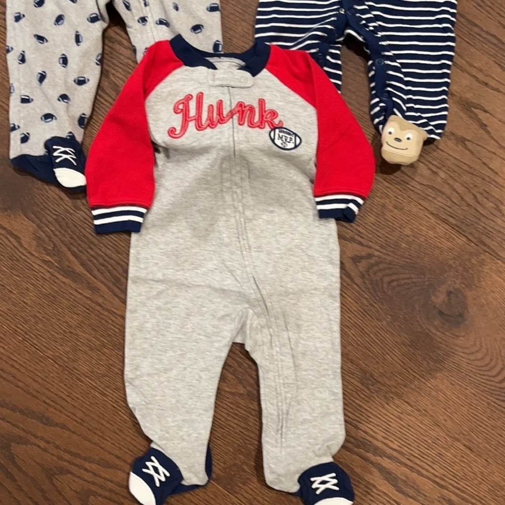 7 Pairs of Carter’s 6 months Footed Pajamas