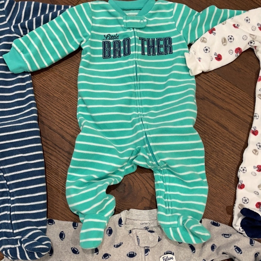 7 Pairs of Carter’s 6 months Footed Pajamas