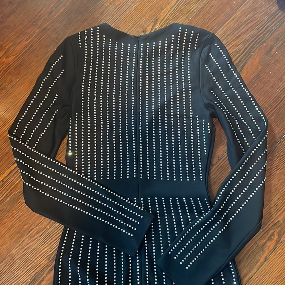 Women’s Black long sleeve body con dress with slit and rhinestone details Size S