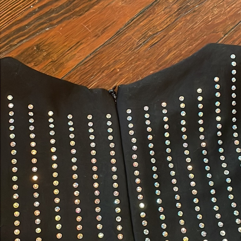 Women’s Black long sleeve body con dress with slit and rhinestone details Size S