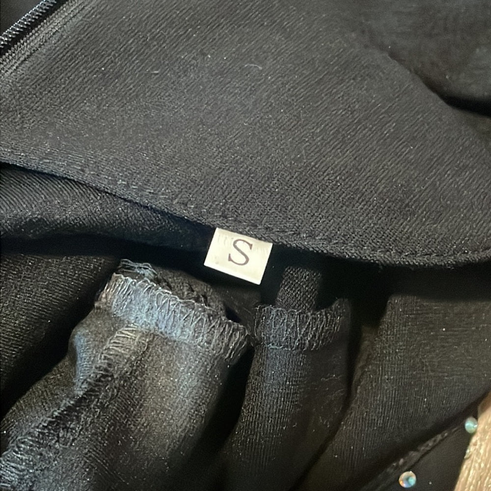 Women’s Black long sleeve body con dress with slit and rhinestone details Size S