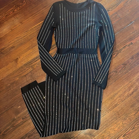Women’s Black long sleeve body con dress with slit and rhinestone details Size S