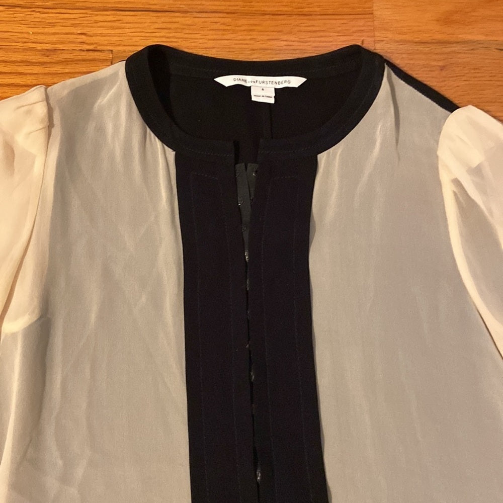 Women’s Diane vonFustenberg long sleeved top.  Black and cream. Size 6