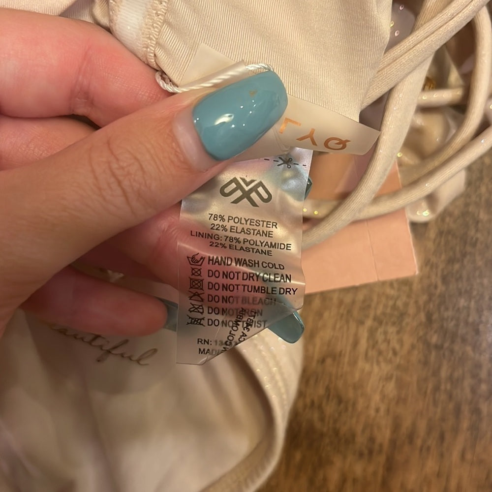 NWT Pilyq Women’s Pink Sparkly V-neck One Piece Size S