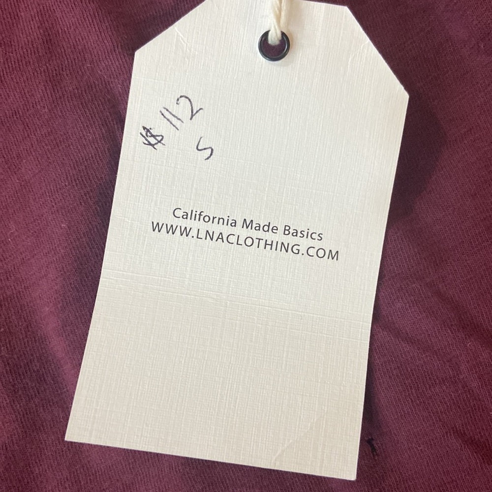 NWT Women’s LNA top. Maroon. Size S