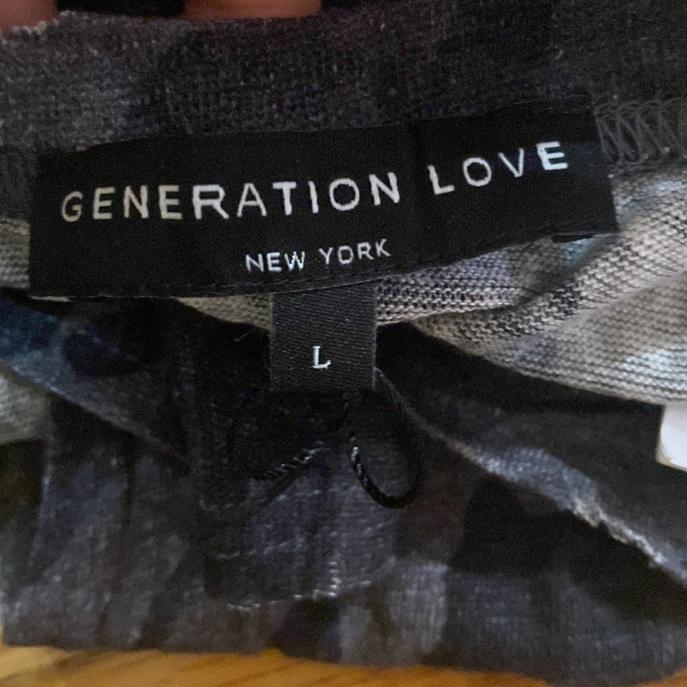 NWT Women’s Generation Love top. Black and grey. Size L
