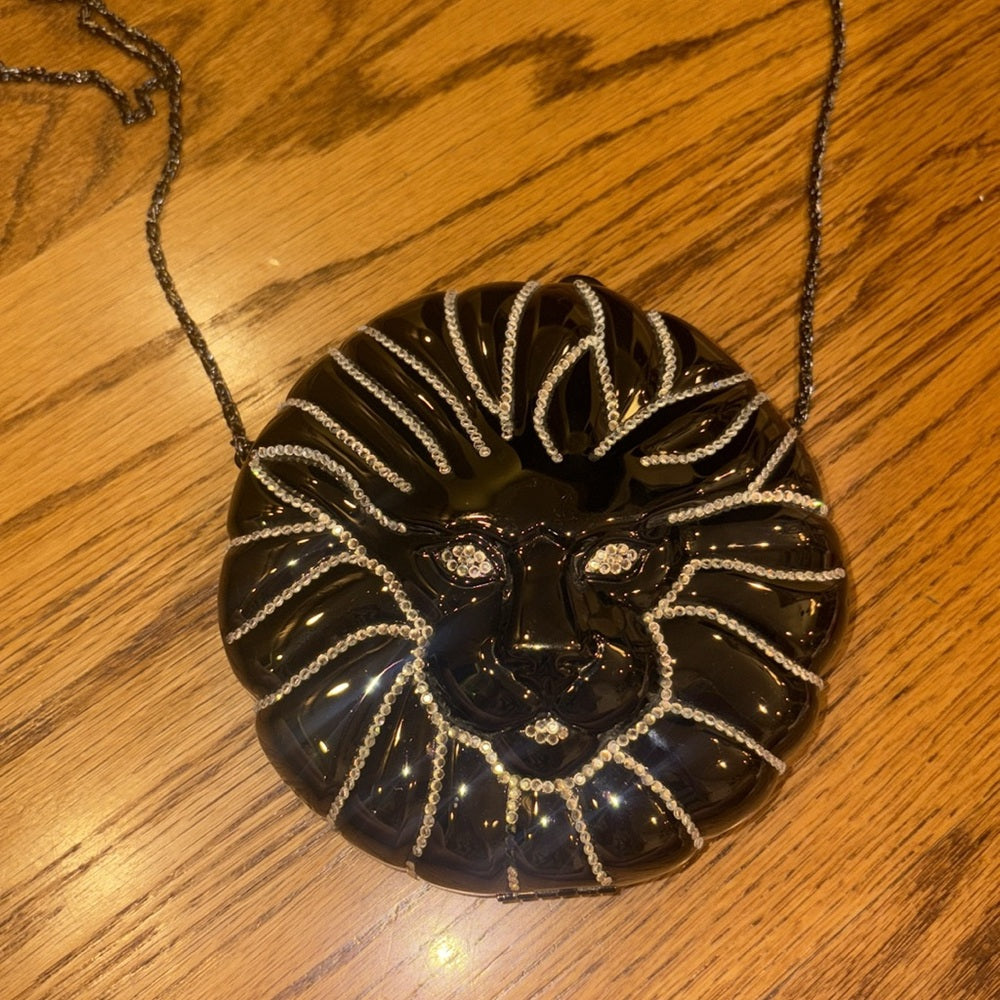 Woman’s Black and Silver Hard Bag