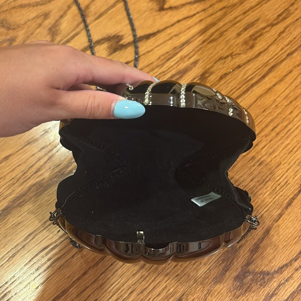 Woman’s Black and Silver Hard Bag