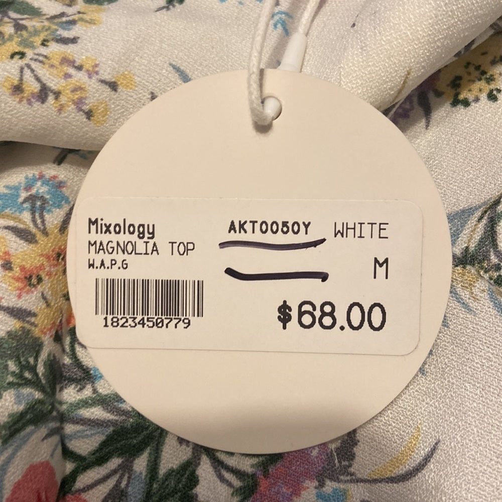 WOMEN’S We’re All Pretty Girls top. White with floral. Size M