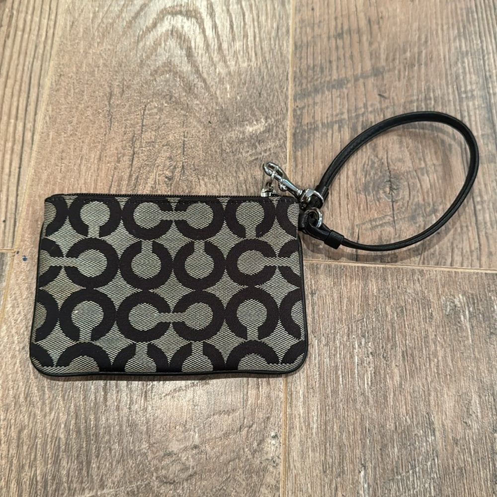 Coach Woman’s Black & Tan Wrislet