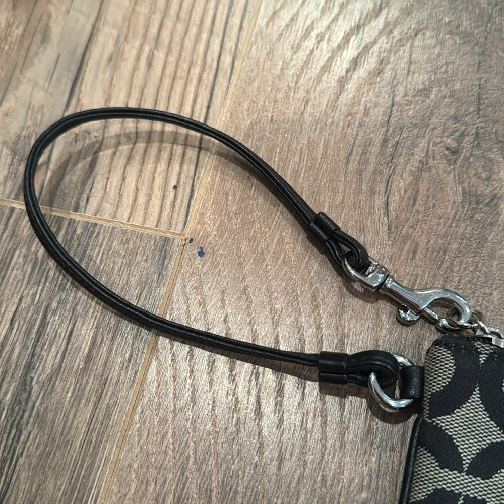 Coach Woman’s Black & Tan Wrislet