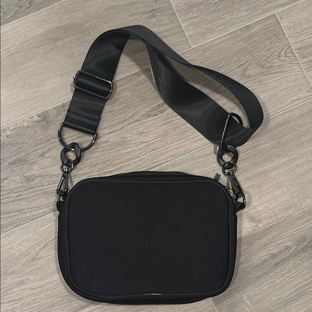 Haute Shore Girls Black and White Crossbody Bag with Pink Accent