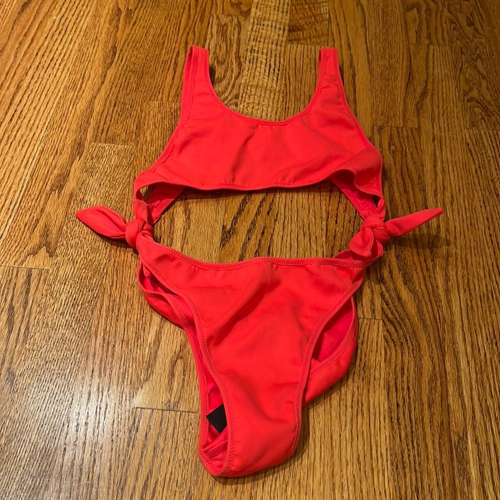 NWT Kendall + Kylie Woman’s Red Cut Out One Piece Size S