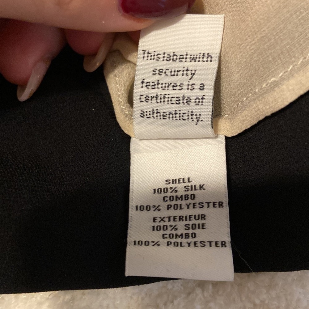 Women’s Diane vonFustenberg long sleeved top.  Black and cream. Size 6
