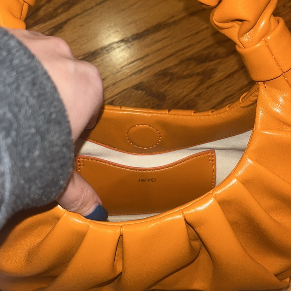 JW Pei Woman’s Orange Hand Bag