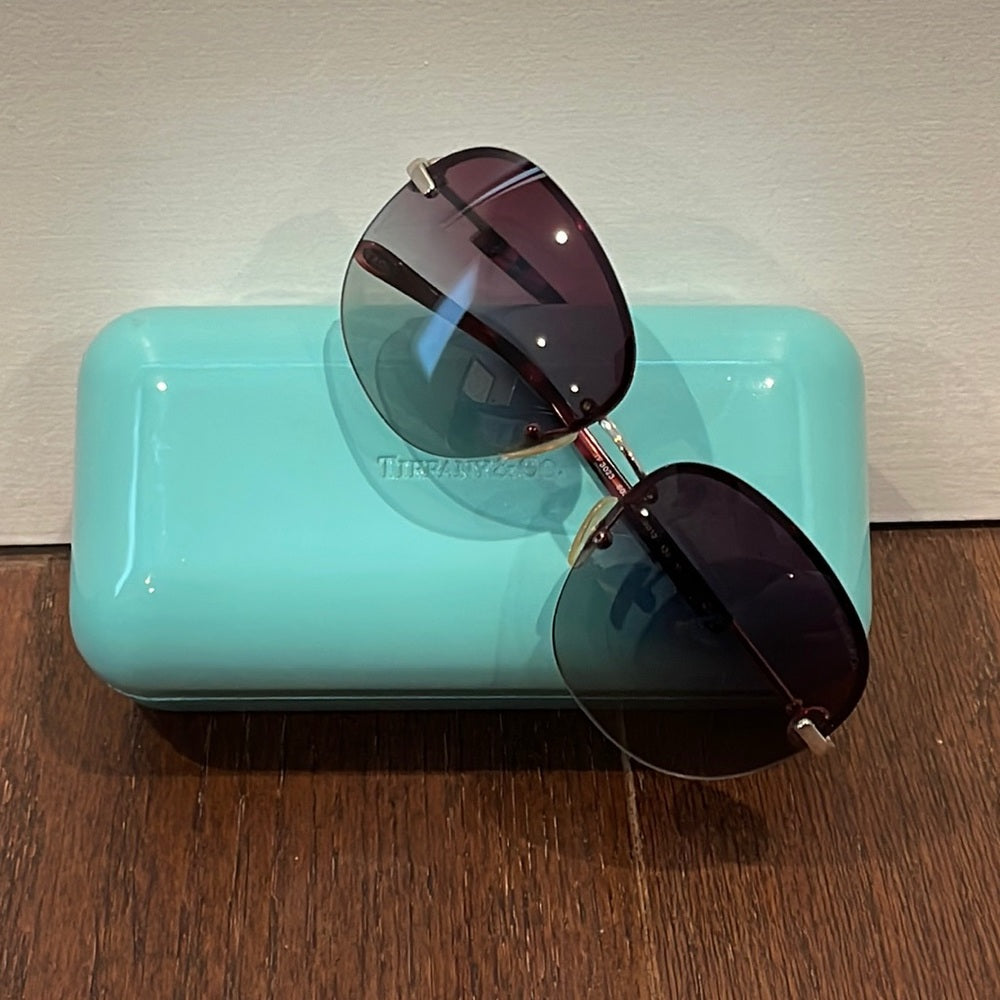 Tiffany & Co Women’s Sunglasses With a Red/Pink to Lenses